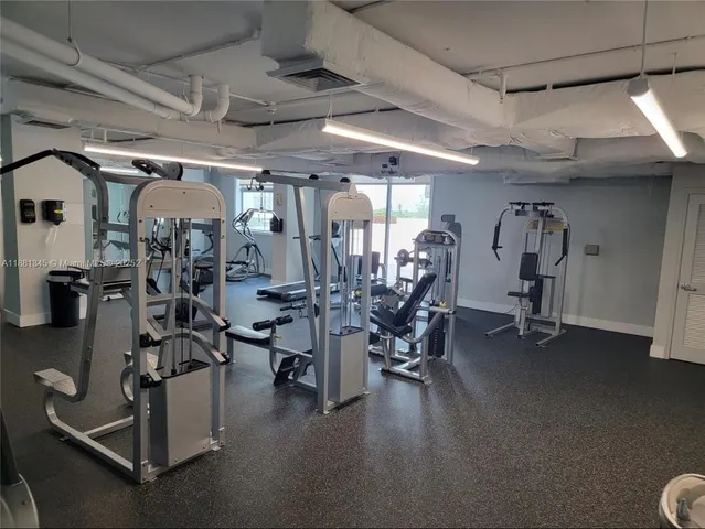 a view of a room with gym equipment