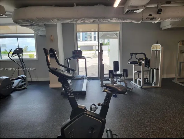 a view of a room with gym equipment