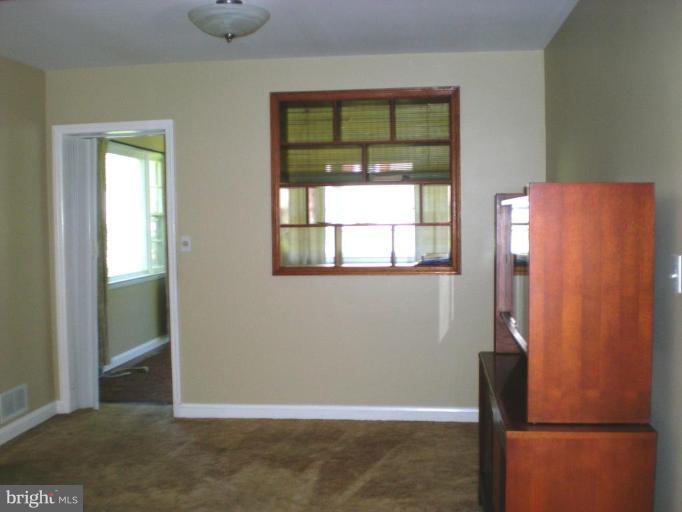 222 Ridgeway Road Catonsville, MD 21228 - Photo 6 of 14 Opening to Fam. Rm. H/W fls under w/w