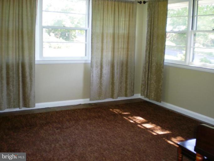 222 Ridgeway Road Catonsville, MD 21228 - Photo 7 of 14 H/W floors under carpet (Freshly painted room)
