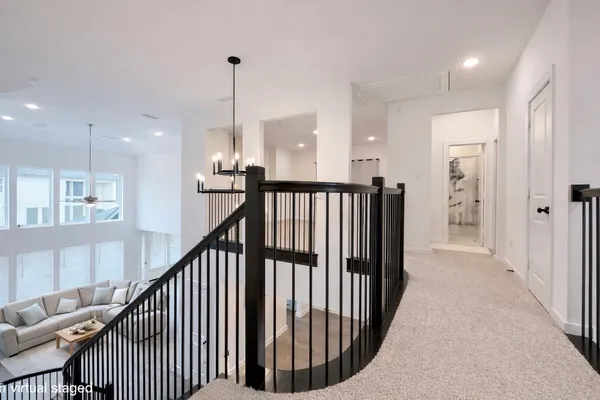 a view of hallway with stairs