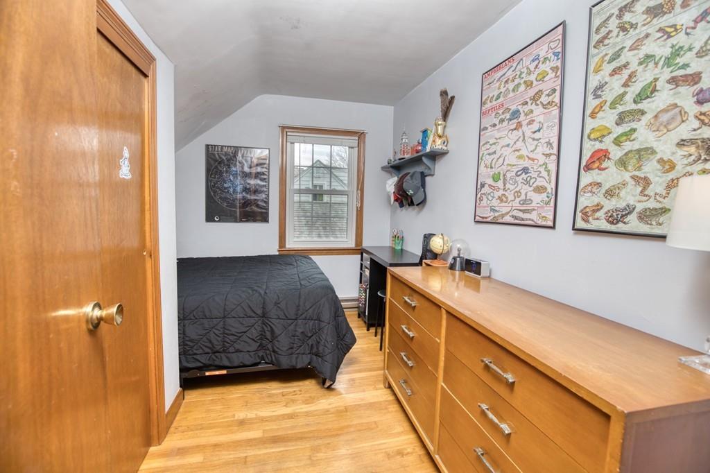 9 Laurel Road Braintree, MA 02184 - Photo 11 of 16 a room with a bed and a window