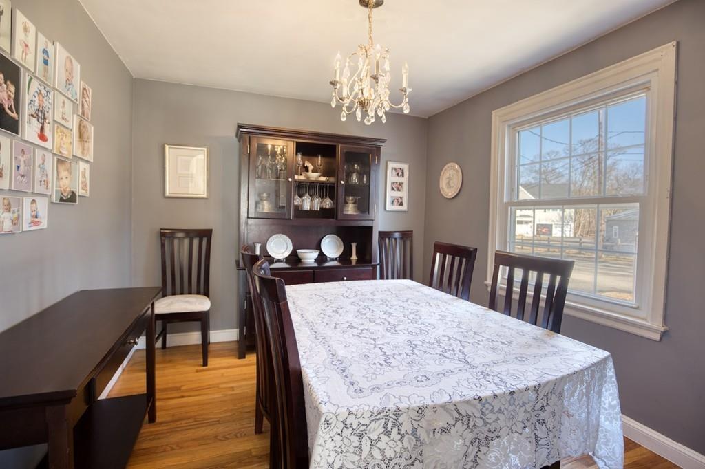 9 Laurel Road Braintree, MA 02184 - Photo 6 of 16 a view of a dining room with furniture and wooden floor