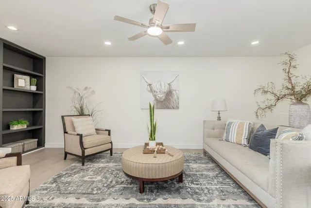 a living room with furniture and a couch