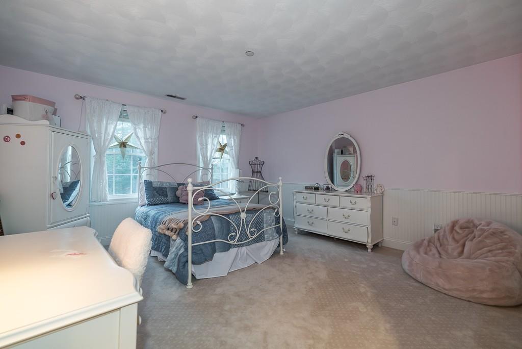32 Parsons Hill Road Wenham, MA 01984 - Photo 16 of 29 a bed room with furniture and a table