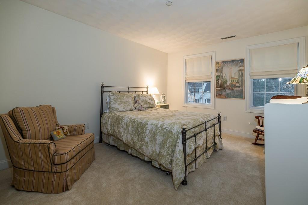 32 Parsons Hill Road Wenham, MA 01984 - Photo 18 of 29 a bedroom with a bed couch and a window