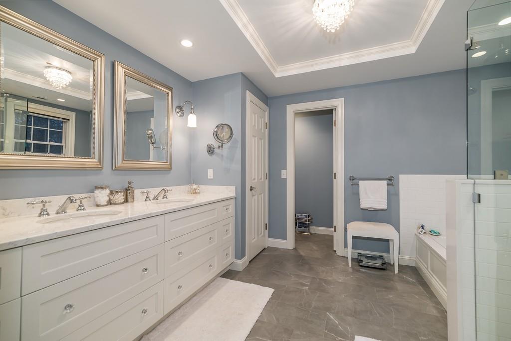 32 Parsons Hill Road Wenham, MA 01984 - Photo 21 of 29 a spacious bathroom with a double vanity sink and a mirror