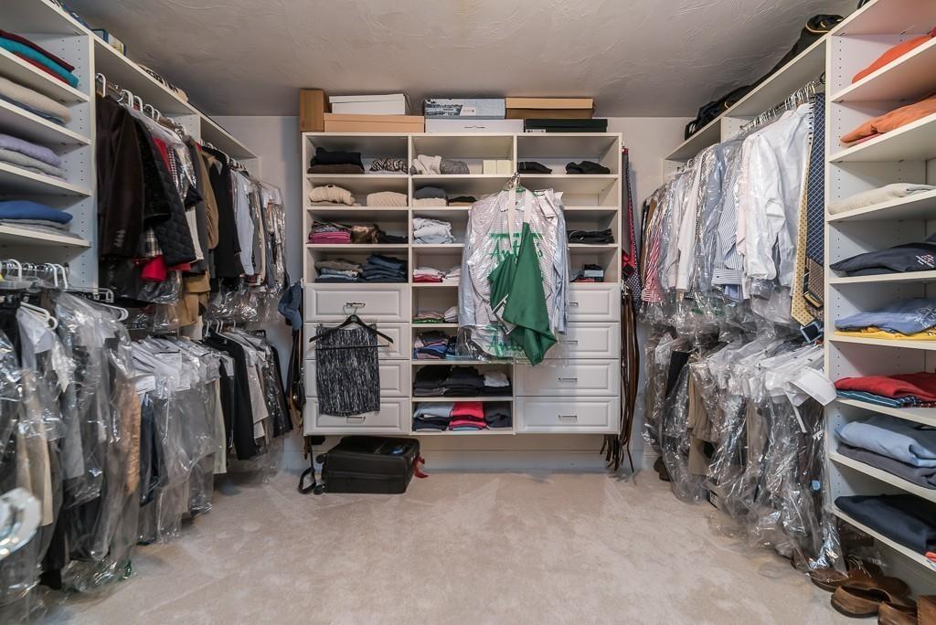 32 Parsons Hill Road Wenham, MA 01984 - Photo 23 of 29 a view of walk in closet with clothes and shoes