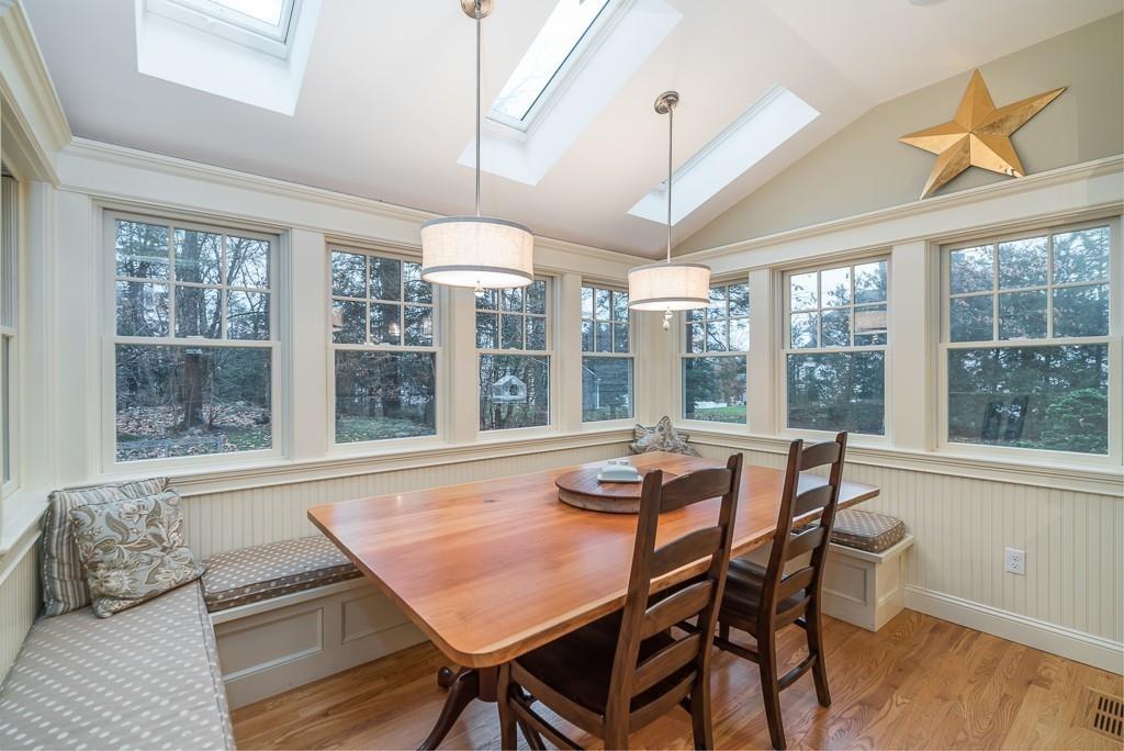 32 Parsons Hill Road Wenham, MA 01984 - Photo 7 of 29 a view of a dining room with furniture wooden floor and chandelier