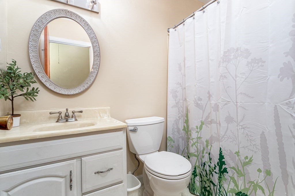 30 Gray Road Templeton, MA 01468 - Photo 23 of 42 a bathroom with a toilet a sink and a mirror