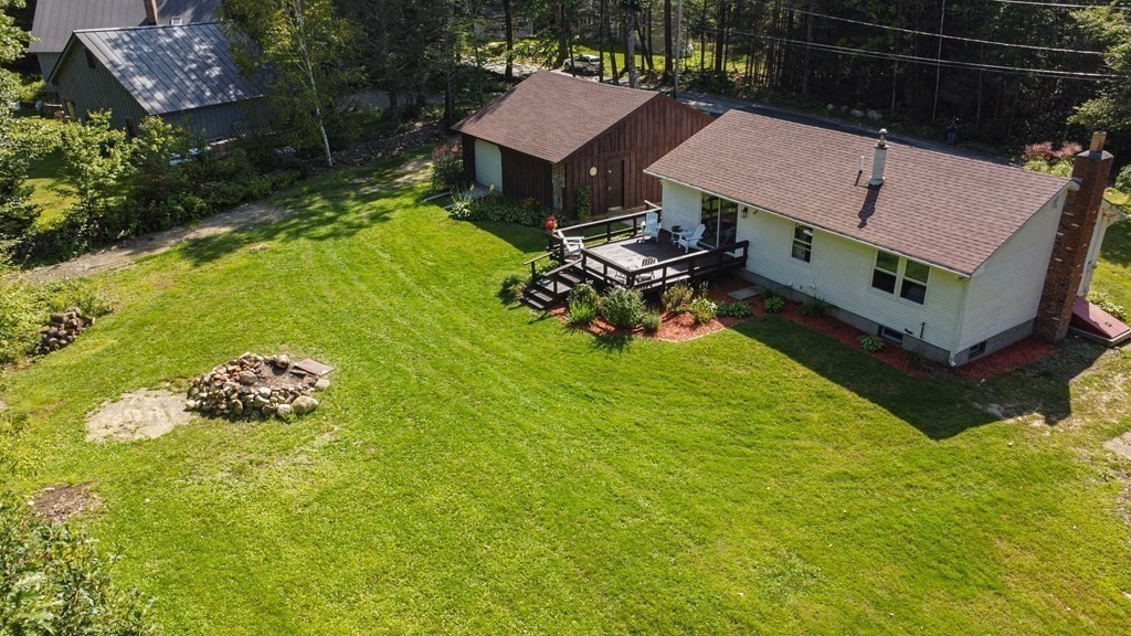 30 Gray Road Templeton, MA 01468 - Photo 9 of 42 a backyard of a house with table and chairs