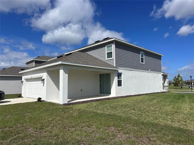 a front view of house with yard