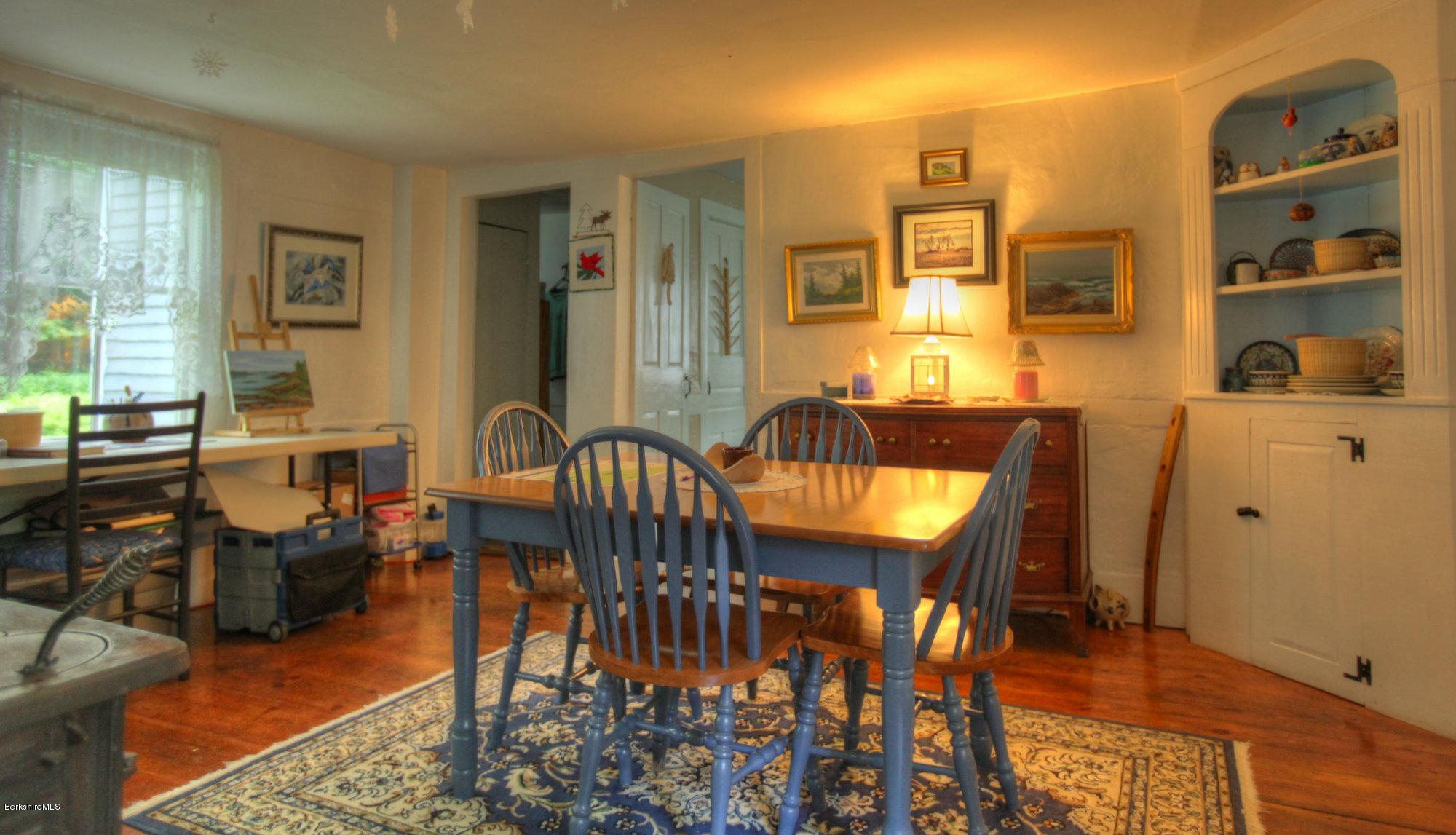 58 Mt Hunger Road Monterey, MA 01245 - Photo 12 of 32 a view of a dining room with furniture