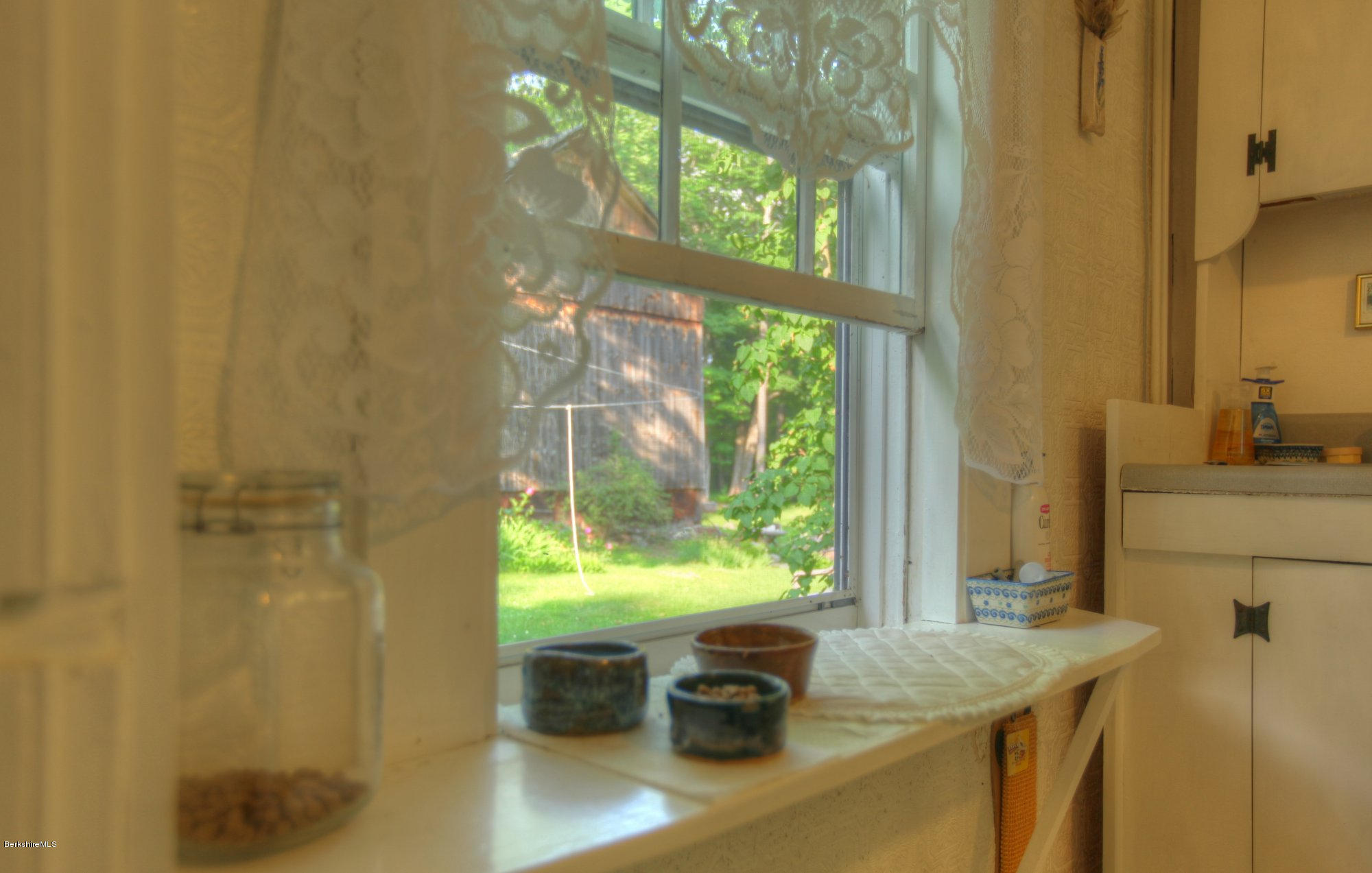 58 Mt Hunger Road Monterey, MA 01245 - Photo 20 of 32 a room with a sink and a large window