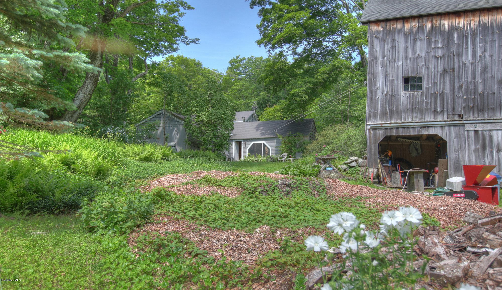 58 Mt Hunger Road Monterey, MA 01245 - Photo 29 of 32 a front view of a house with garden