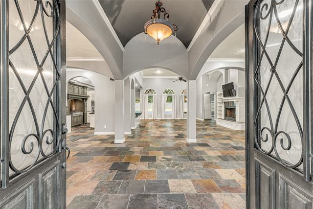 a view of a entryway door with brick walls