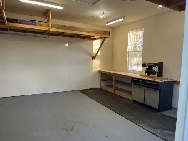 a room with furniture and window