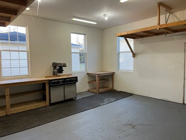 a room with furniture and window