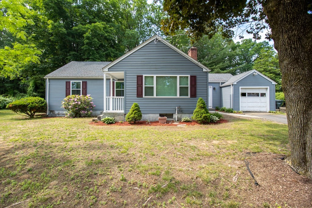 139 Fox Hill Road Springfield, MA 01118 - Photo 1 of 36 a front view of a house with garden