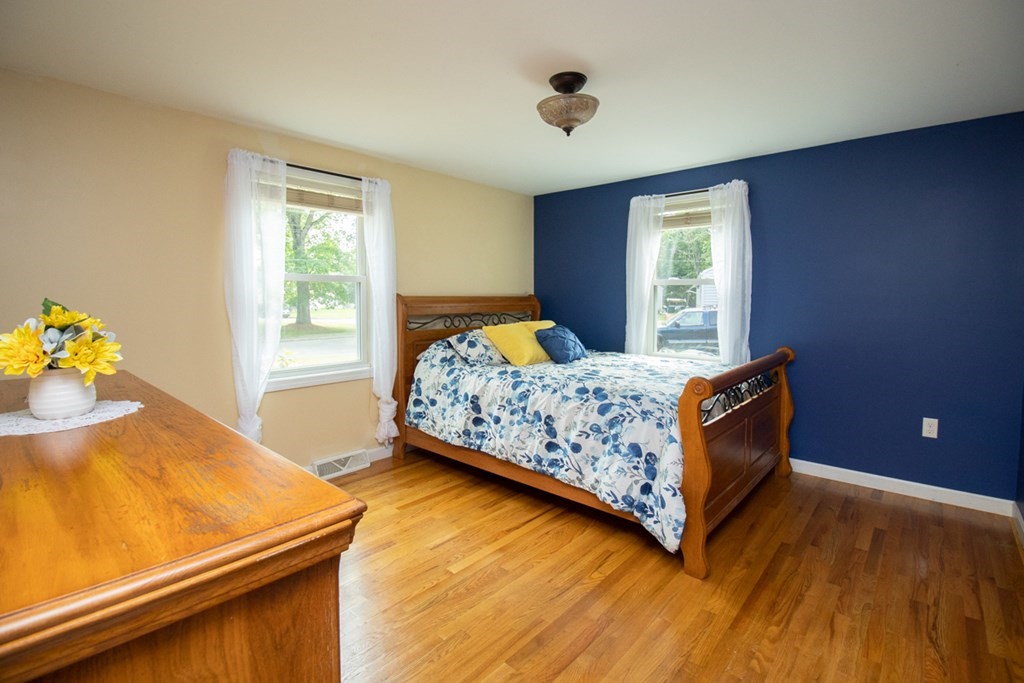 139 Fox Hill Road Springfield, MA 01118 - Photo 23 of 36 a bed sitting in a bedroom next to a window