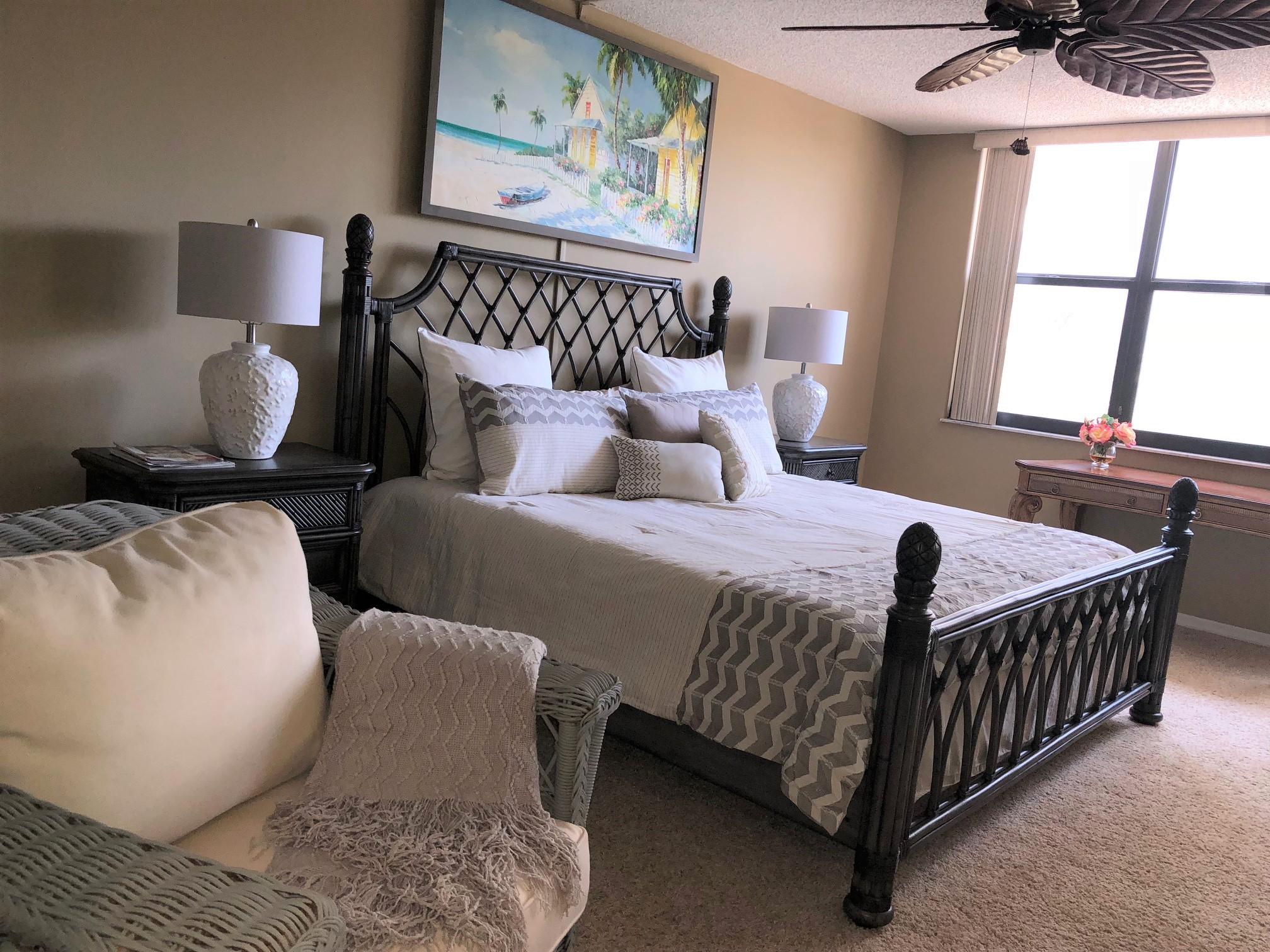 3400 North Ocean Drive, Unit 306 Riviera Beach, FL 33404 - Photo 12 of 52 a bedroom with a bed and window
