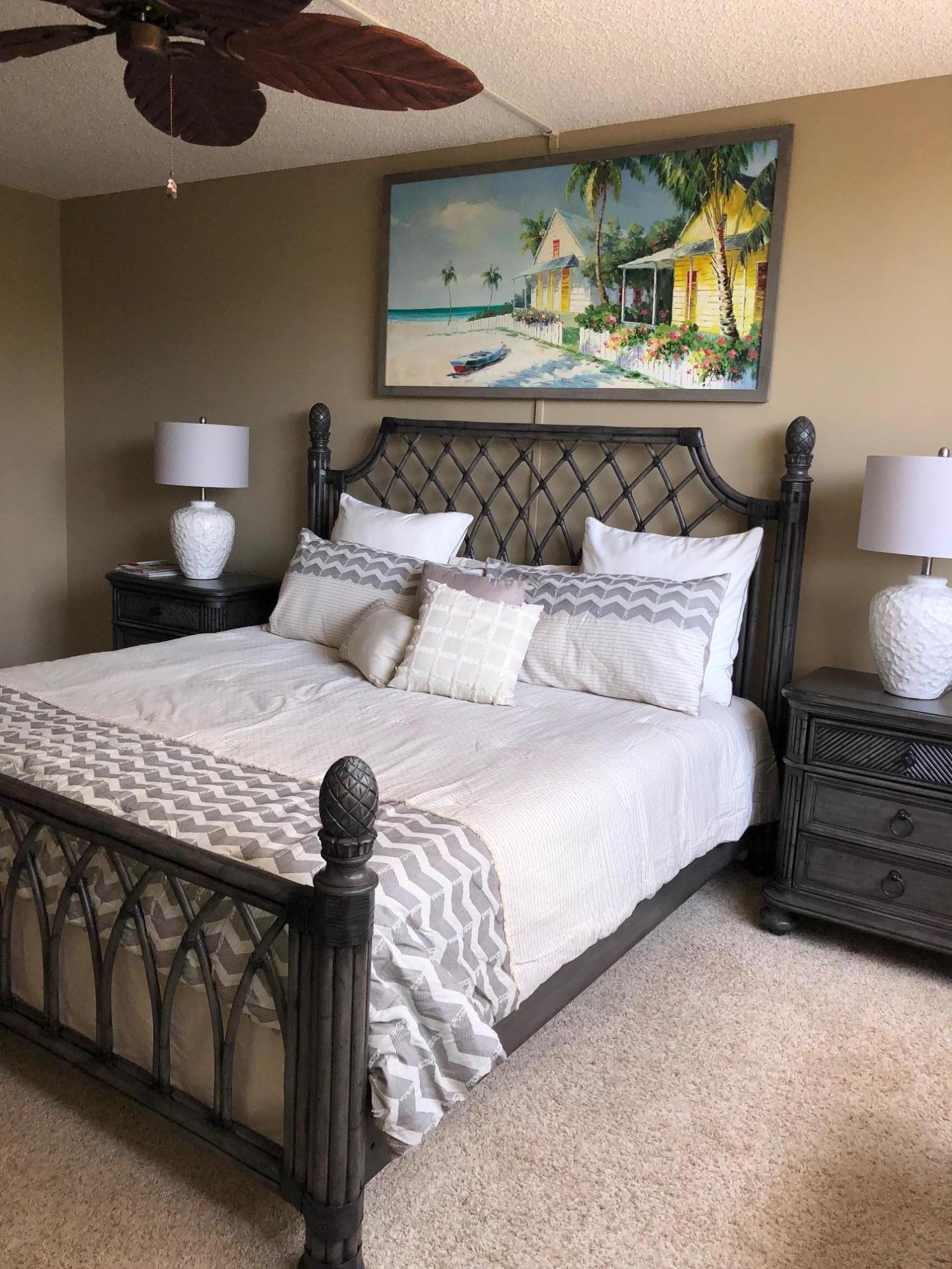 3400 North Ocean Drive, Unit 306 Riviera Beach, FL 33404 - Photo 15 of 52 a bedroom with a bed and a dresser
