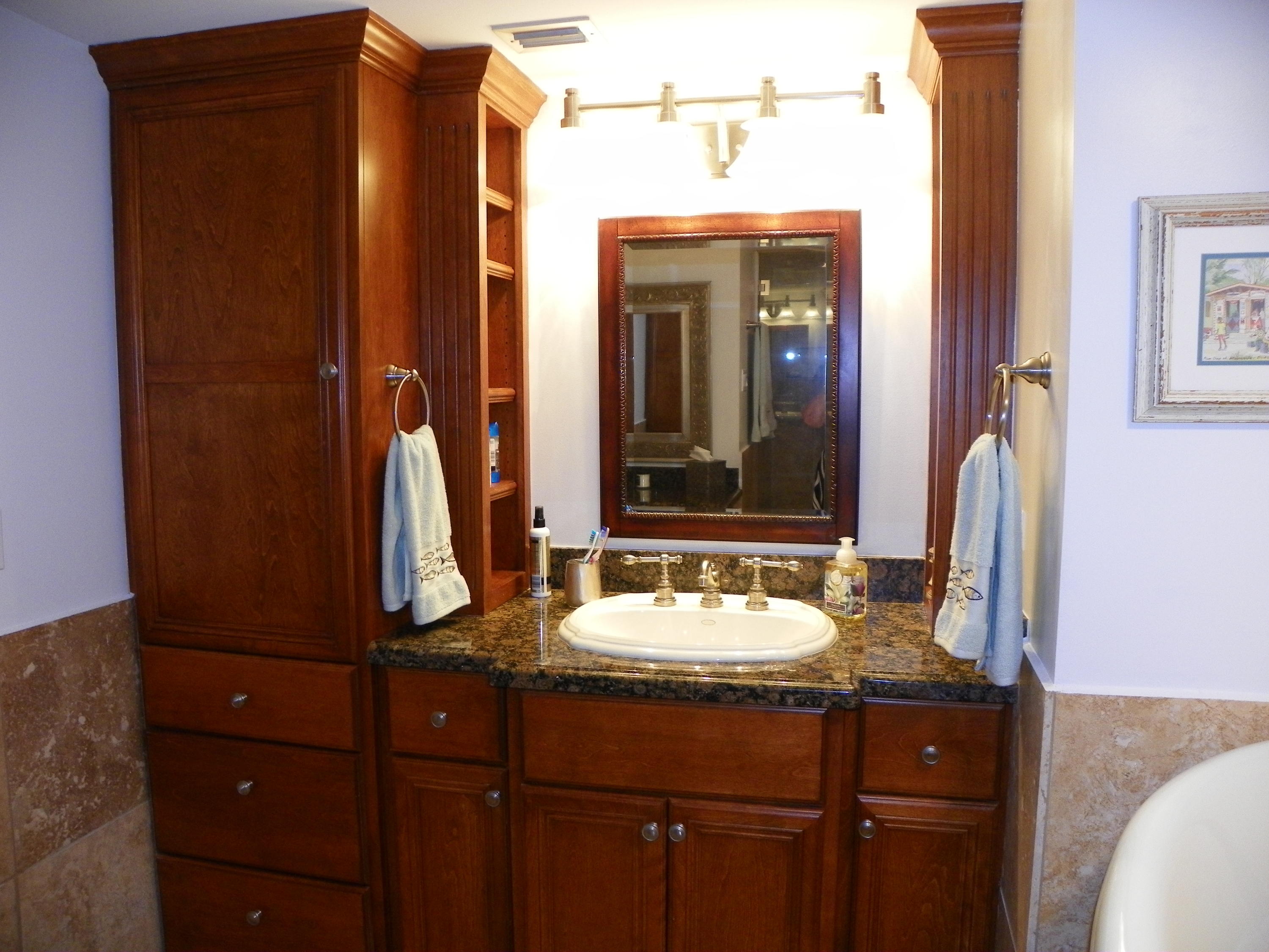 3400 North Ocean Drive, Unit 306 Riviera Beach, FL 33404 - Photo 16 of 52 a bathroom with a sink and a mirror
