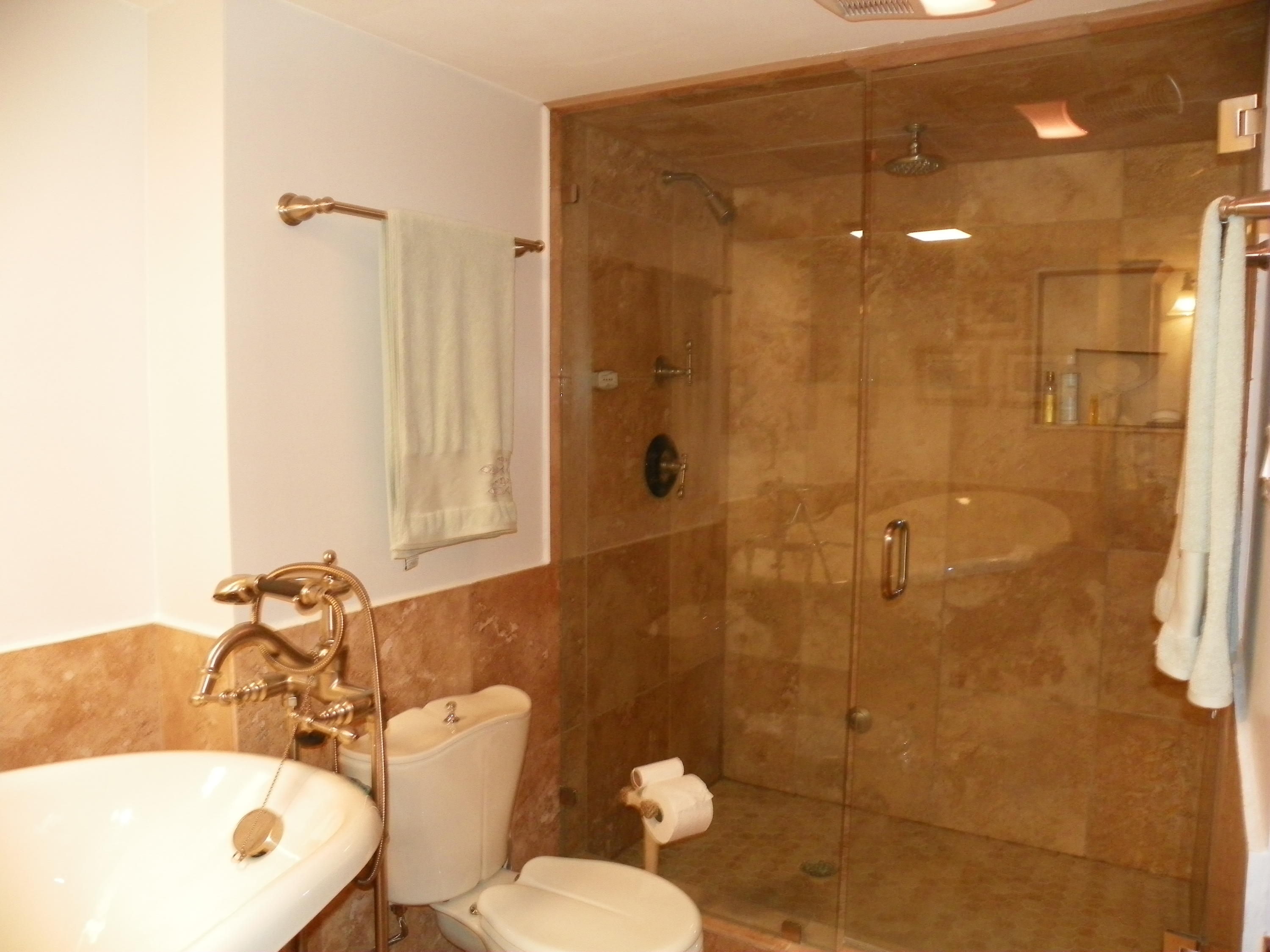 3400 North Ocean Drive, Unit 306 Riviera Beach, FL 33404 - Photo 18 of 52 a bathroom with a sink toilet and shower