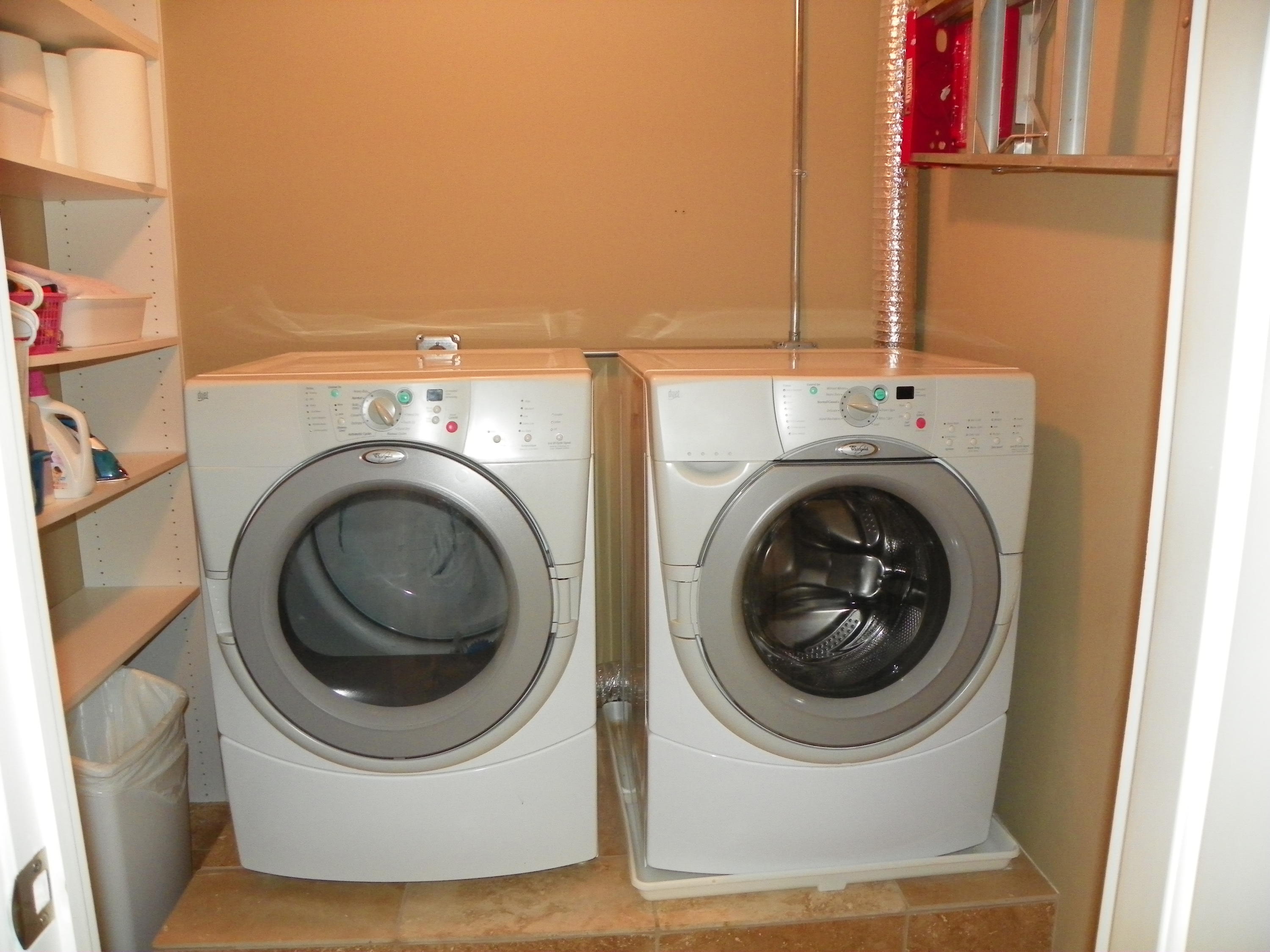 3400 North Ocean Drive, Unit 306 Riviera Beach, FL 33404 - Photo 20 of 52 a utility room with dryer and washer