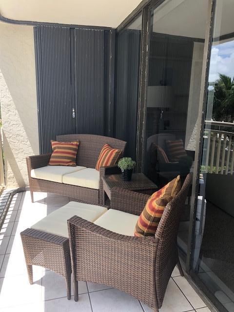 3400 North Ocean Drive, Unit 306 Riviera Beach, FL 33404 - Photo 27 of 52 a outdoor living space with furniture
