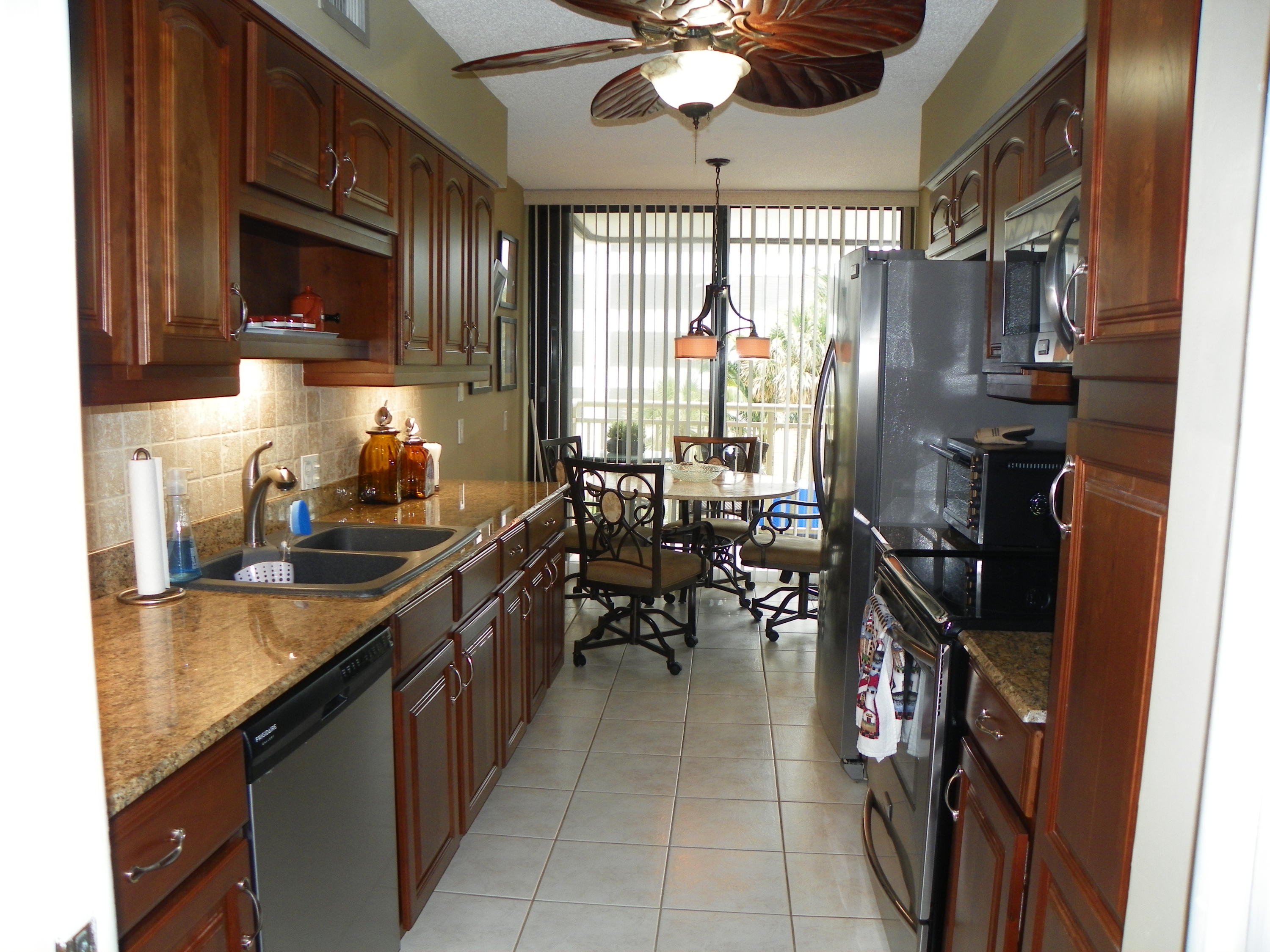 3400 North Ocean Drive, Unit 306 Riviera Beach, FL 33404 - Photo 3 of 52 a kitchen with lots of counter top space