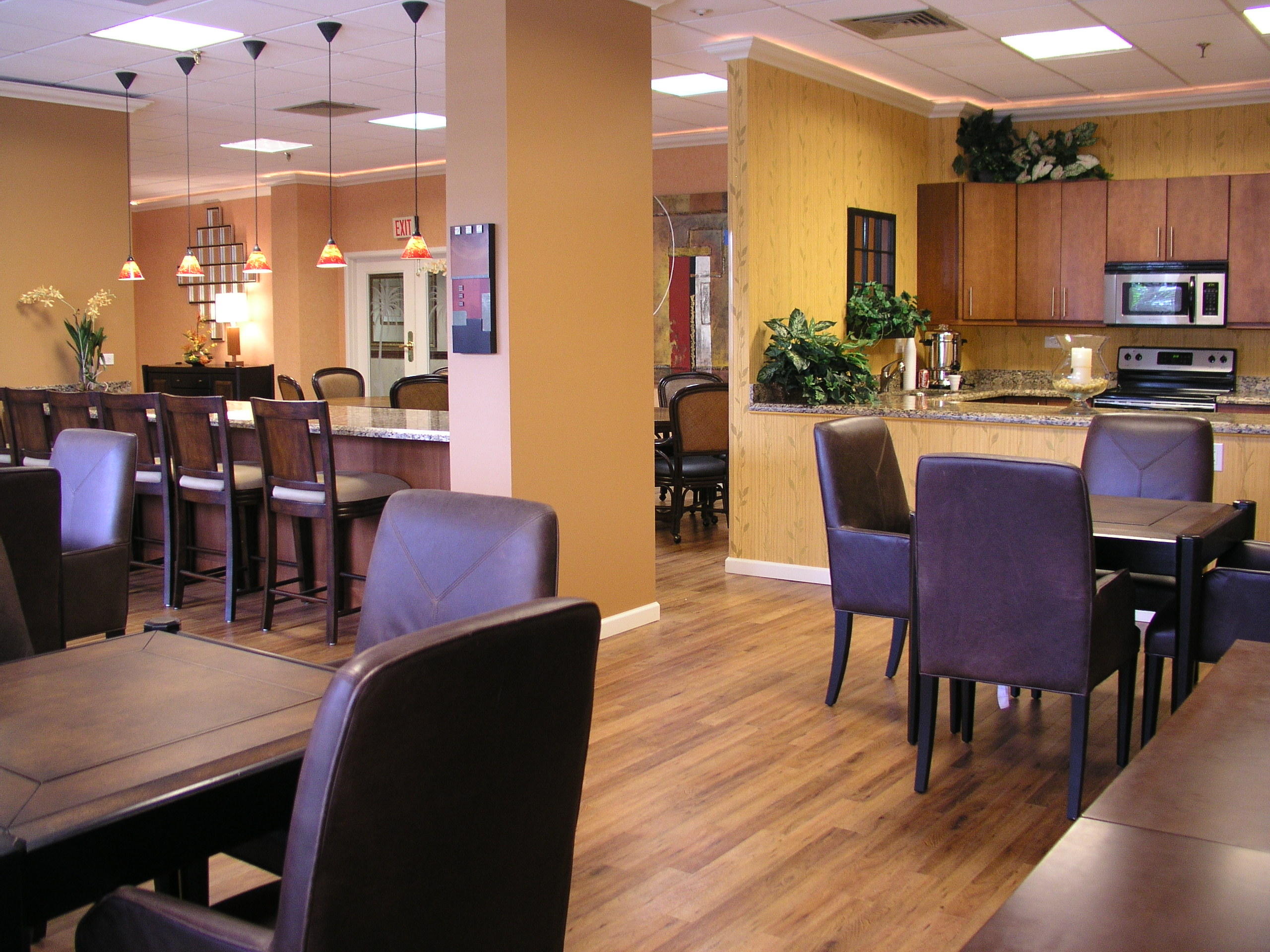 3400 North Ocean Drive, Unit 306 Riviera Beach, FL 33404 - Photo 48 of 52 a view of a dining room with furniture and wooden floor