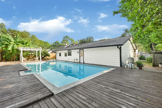 a view of a backyard of the house