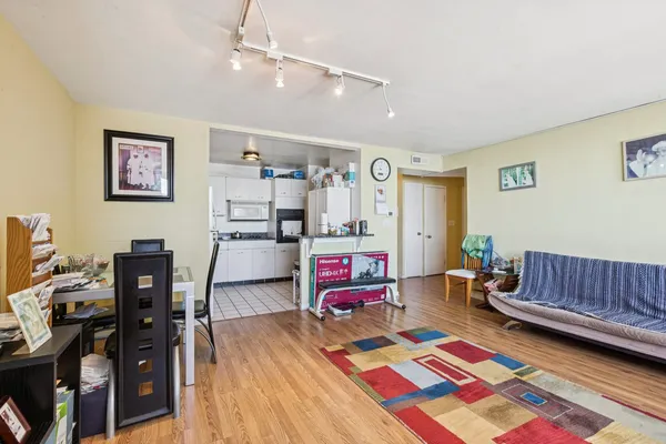 a room with furniture and a baby crib