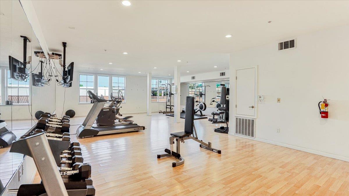 1388 Broadway, Unit 407 Millbrae, CA 94030 - Photo 23 of 28 a view of a room with gym equipment