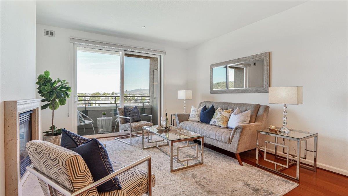 1388 Broadway, Unit 407 Millbrae, CA 94030 - Photo 10 of 28 a living room with furniture and a large window