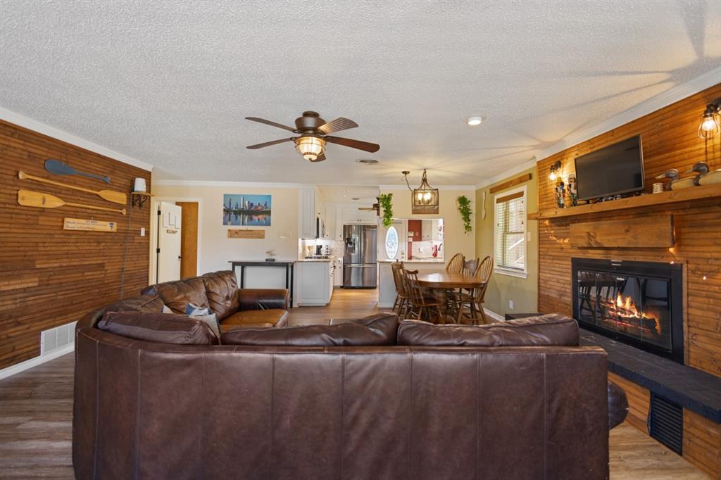 227 Scenic Road Trinidad, TX 75163 - Photo 13 of 40 a living room with furniture and fireplace