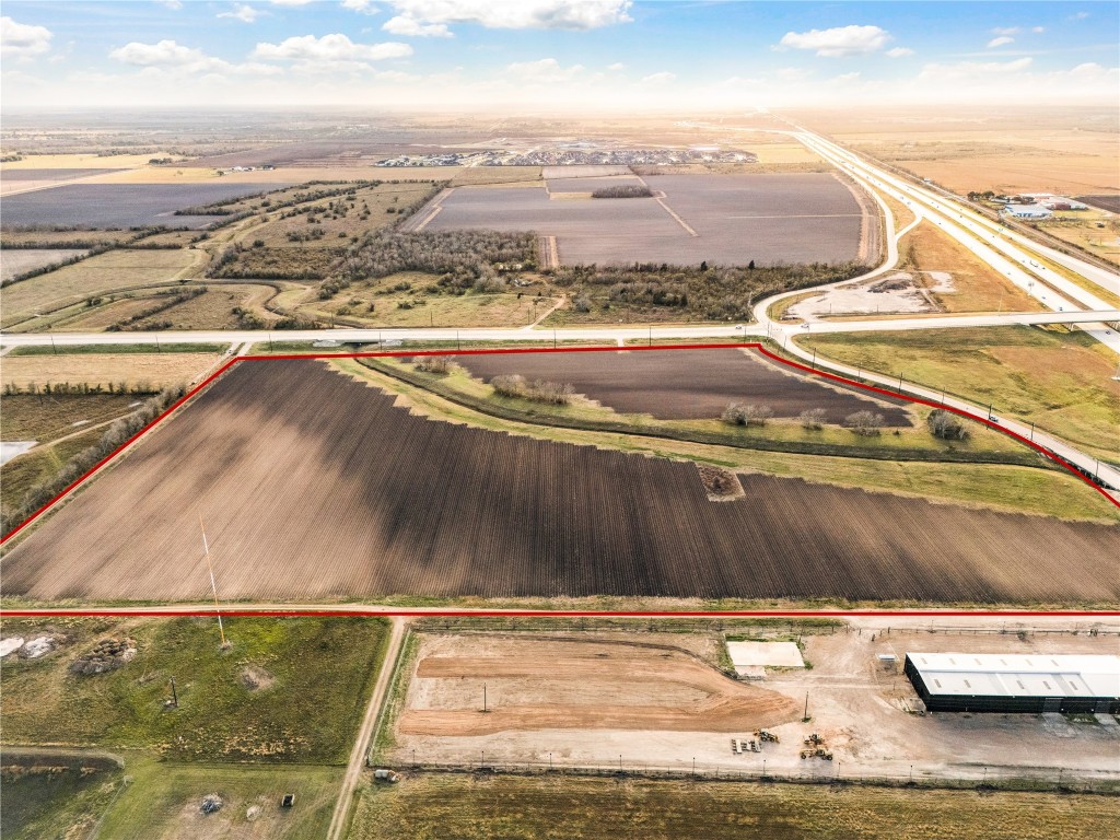 0 Hartledge Road Rosenberg, TX 77471 - Photo 4 of 13 Expansive agricultural land bordered by roads, perfect for development or farming. Open fields with clear boundaries, offering easy access to highways and potential for various uses.