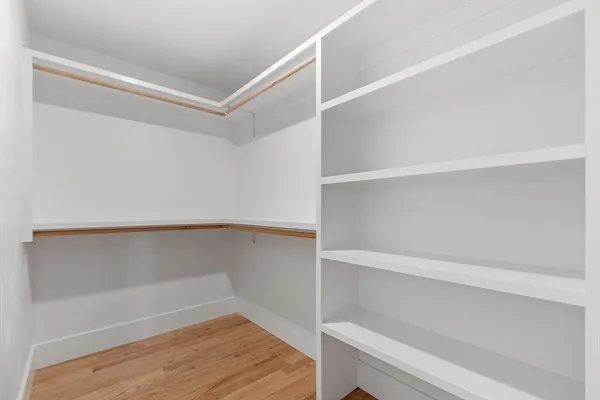a view of an empty walk in closet