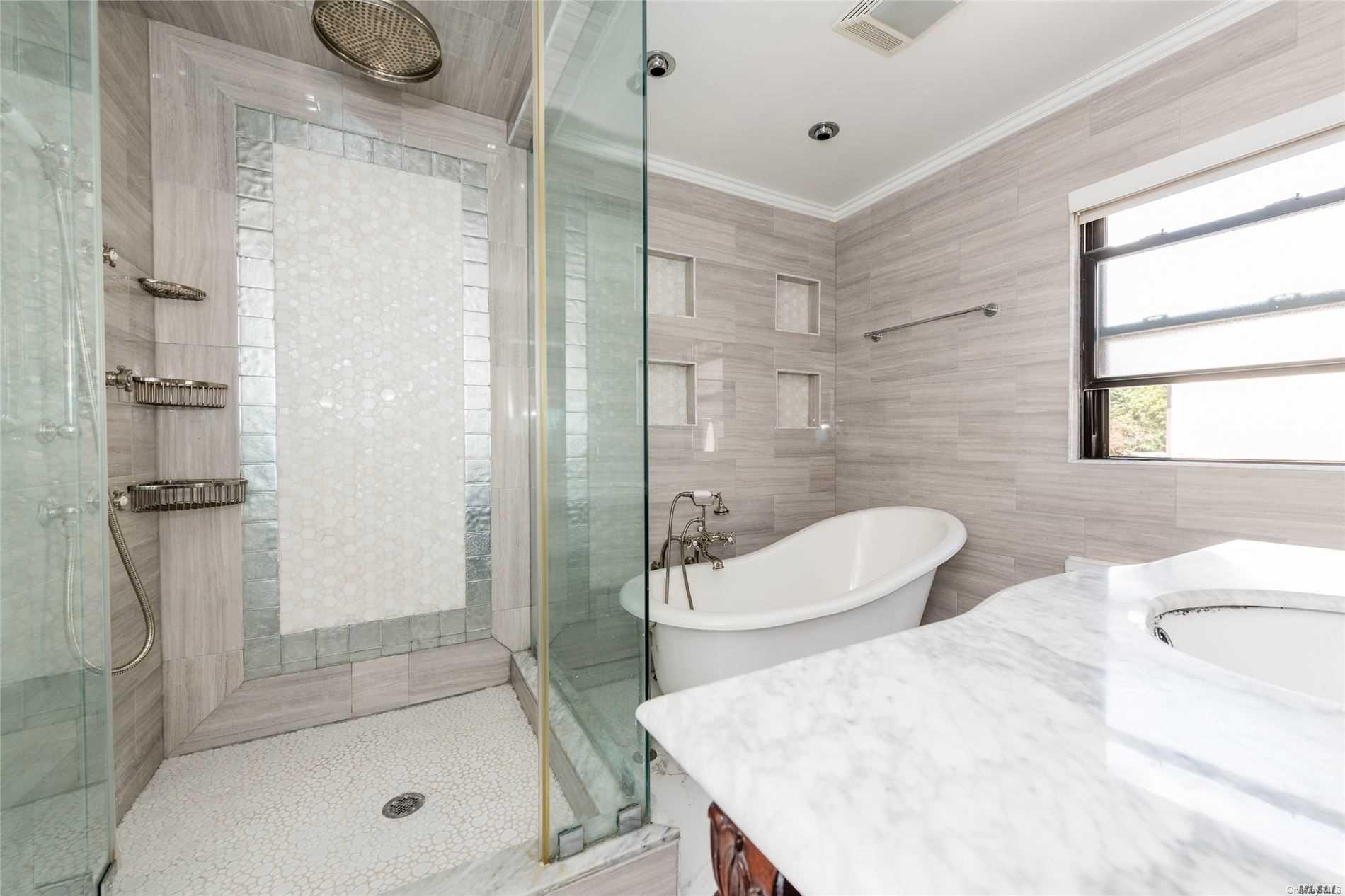 85-36 Wareham Place Queens, NY 11432 - Photo 13 of 26 a bathroom with a sink a toilet and shower