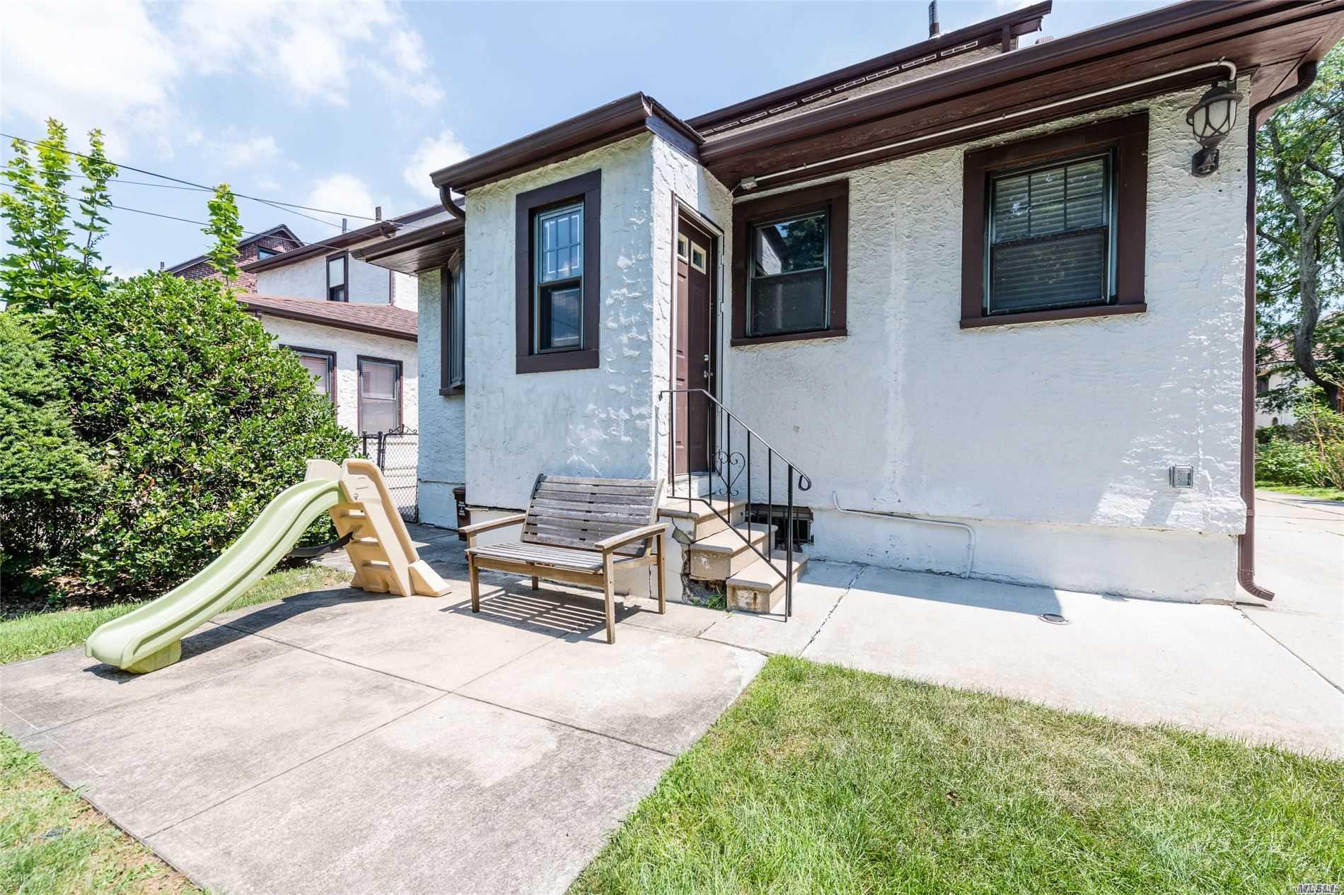 85-36 Wareham Place Queens, NY 11432 - Photo 21 of 26 a view of a house with backyard and sitting area