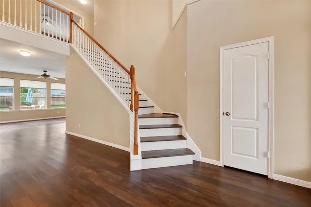 a view of entryway with wooden floor
