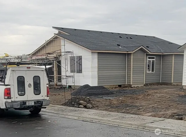 a view of a house with a garage