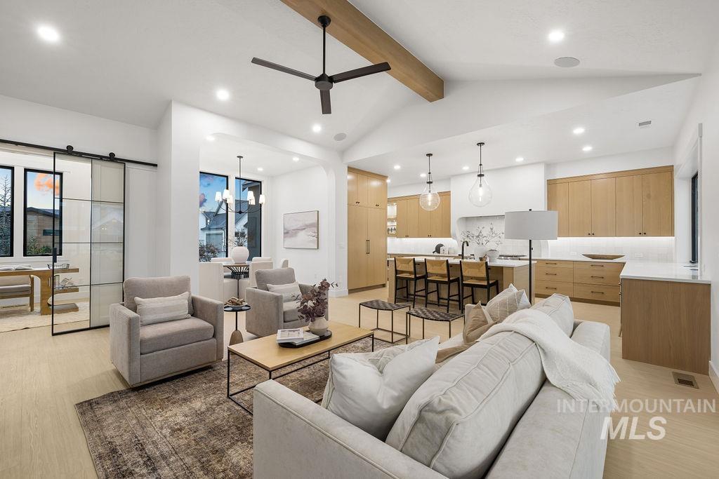 494 Century Avenue Middleton, ID 83644 - Photo 13 of 50 Living area featuring a ceiling fan, light wood-style flooring, recessed lighting, and a barn door