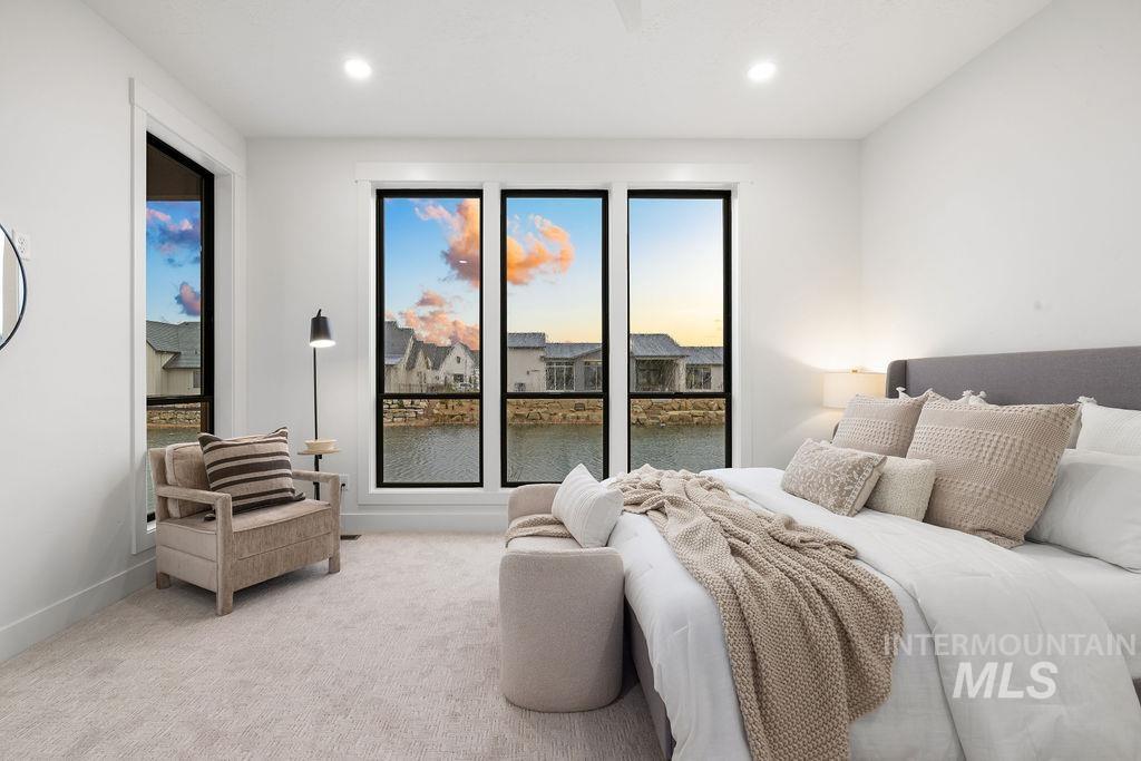 494 Century Avenue Middleton, ID 83644 - Photo 29 of 50 Bedroom with a water view, light colored carpet, and recessed lighting