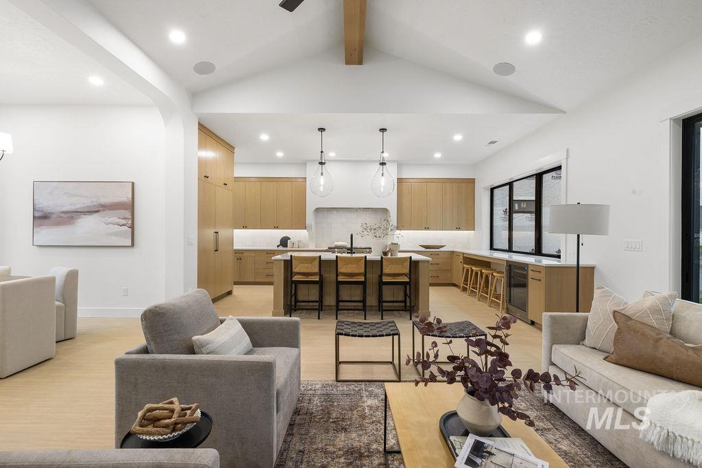 494 Century Avenue Middleton, ID 83644 - Photo 10 of 50 Living room featuring light wood-style flooring, beverage cooler, ceiling fan, and recessed lighting