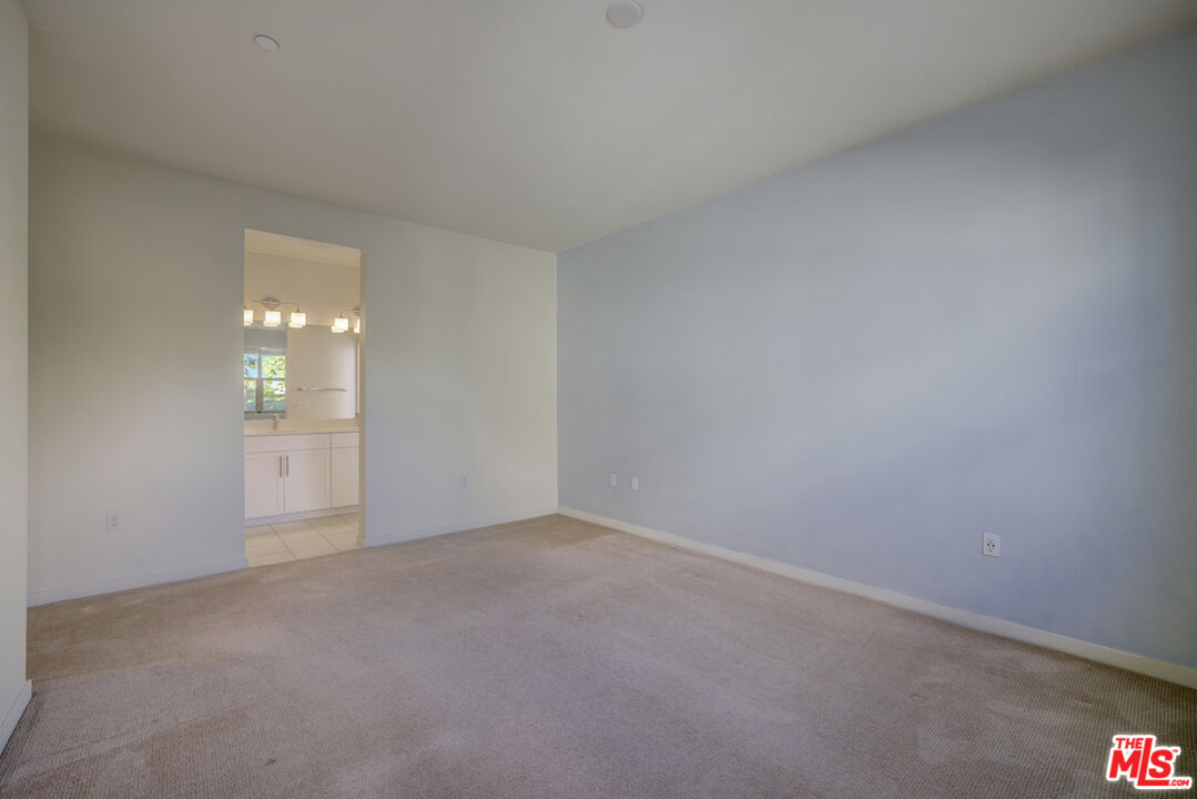 694 Colorado Circle Carson, CA 90745 - Photo 21 of 37 a view of an empty room with glass door