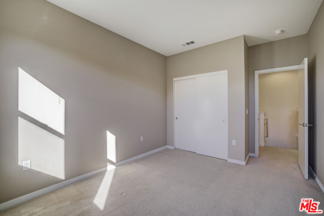 694 Colorado Circle Carson, CA 90745 - Photo 25 of 37 a view of an empty room with a window