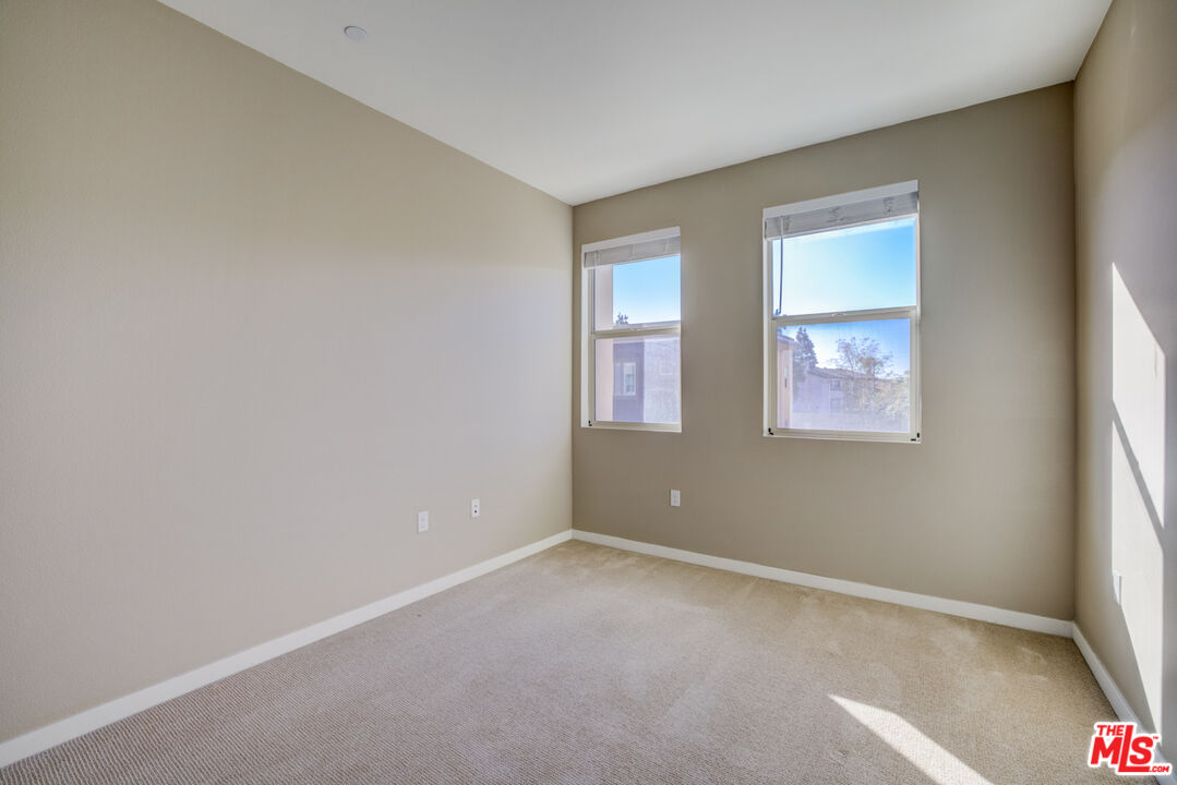 694 Colorado Circle Carson, CA 90745 - Photo 26 of 37 an empty room with windows