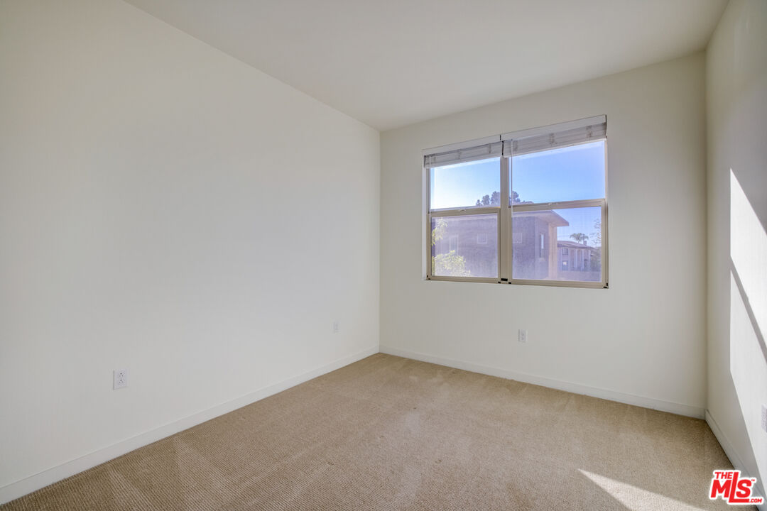 694 Colorado Circle Carson, CA 90745 - Photo 27 of 37 an empty room with windows